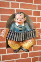 Ornament: Der Musikant
